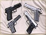 Some more of my pistols wearing G10 grips
