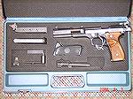 This is a Beretta 92 Target Pistol. Lots of doodads, but a pretty neat pistol.
