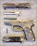 Field stripped CZ-Guns Trade G2000 pistol. Typical link-less browning action.