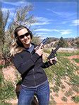 Katie Pavlich: Fox News reporter, conservative, and avid shooter. You'll note some of the guns in these photos are Volquartsen customs.