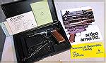 Swiss AT84S with original box, magazines, cleaning supplies, manual, warranty card, and catalogs from Action Arms.