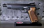 This is the target variation ("-5") of the original Sig P210 Series of pistols, with target sights, target trigger and 5" barrel with the front sight mounted on the barrel.