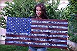 Girl with Pledge of Allegiance board