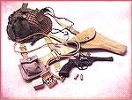 My Enfield No2Mk1 revolver (manufactured 1937). Markings on the revolver indicate it was originally issued to the British Royal Tank Corps. It is shown with the appropriate web equipment. Cartridges a