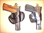 Here are two holsters; the one on the left is a Dillon C.L.S. Holster with my Norinco 1911, and the one on the right is a Gould & Goodrich B801 holster, with my Browning HP.
I find the Dillon holster